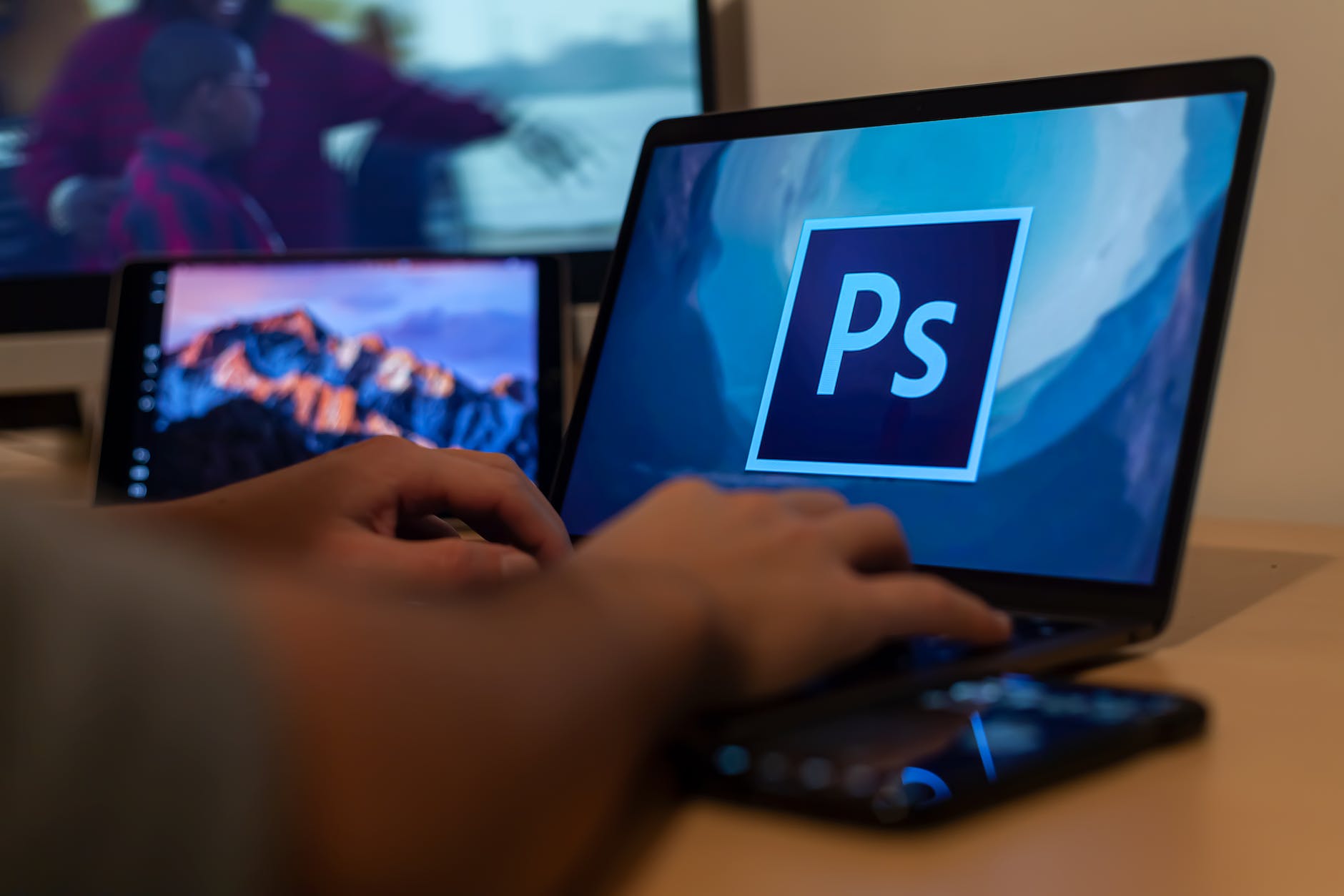 close up shot of a person using a laptop, Adobe Photoshop